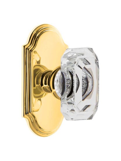 Grandeur Arc Rosette Door Set with Clear Crystal-Glass Baguette Knobs in Polished Brass.